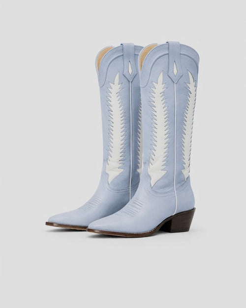 Clean white leather inlay with classic western detailing