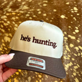 Cream and brown hat with He’s Hunting embroidered in chocolate brown lettering